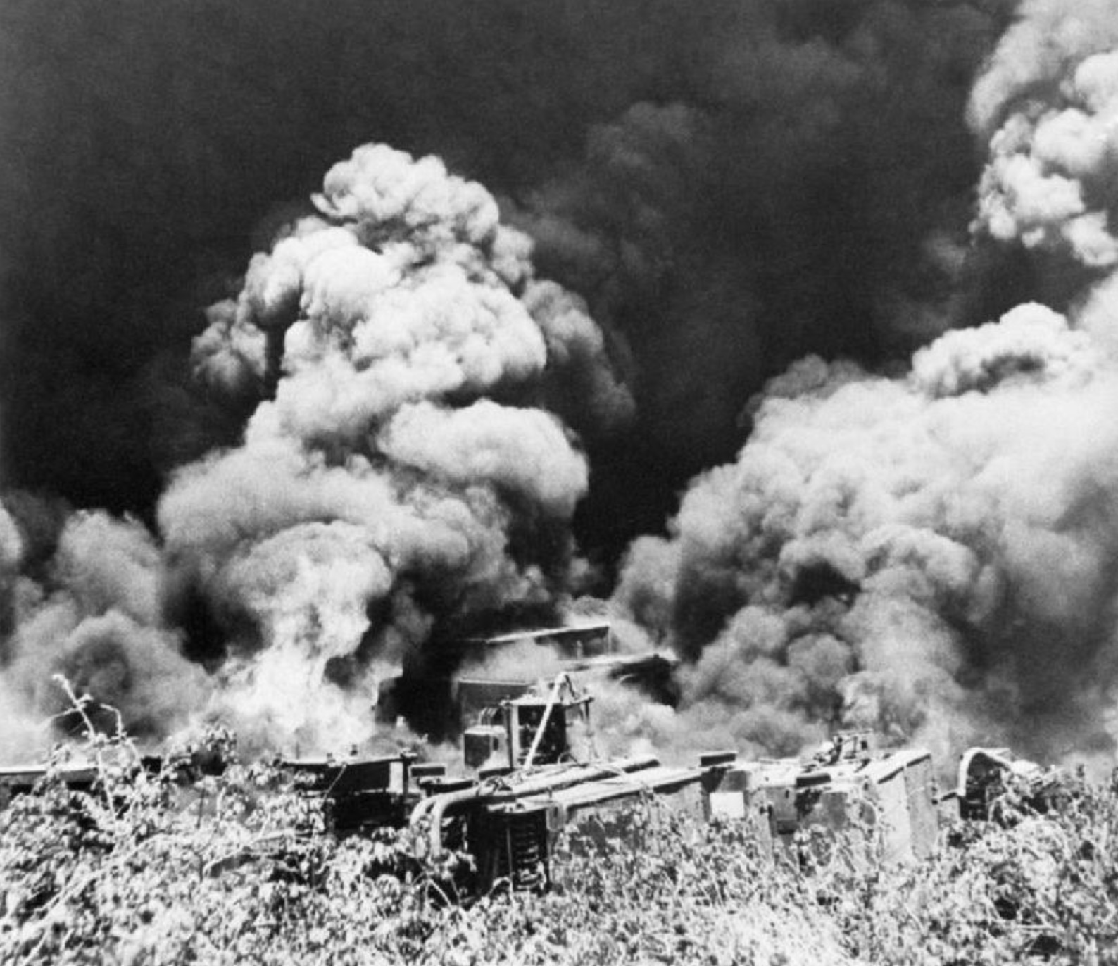 British troops destroy equipment and machinery at the Yenangyaung oil fields before retreating. 
